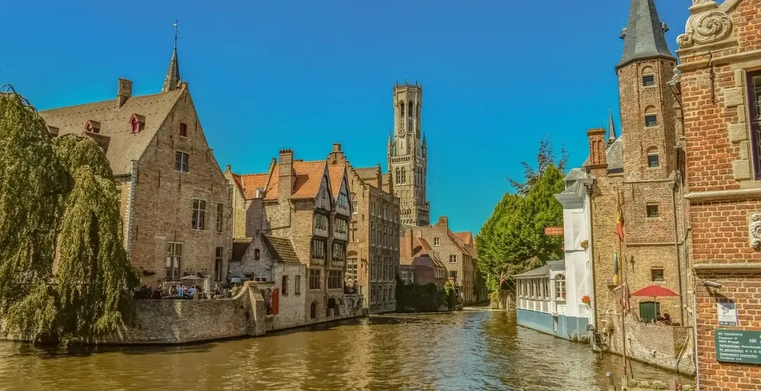 Charming canals and medieval architecture in Bruges, Belgium.