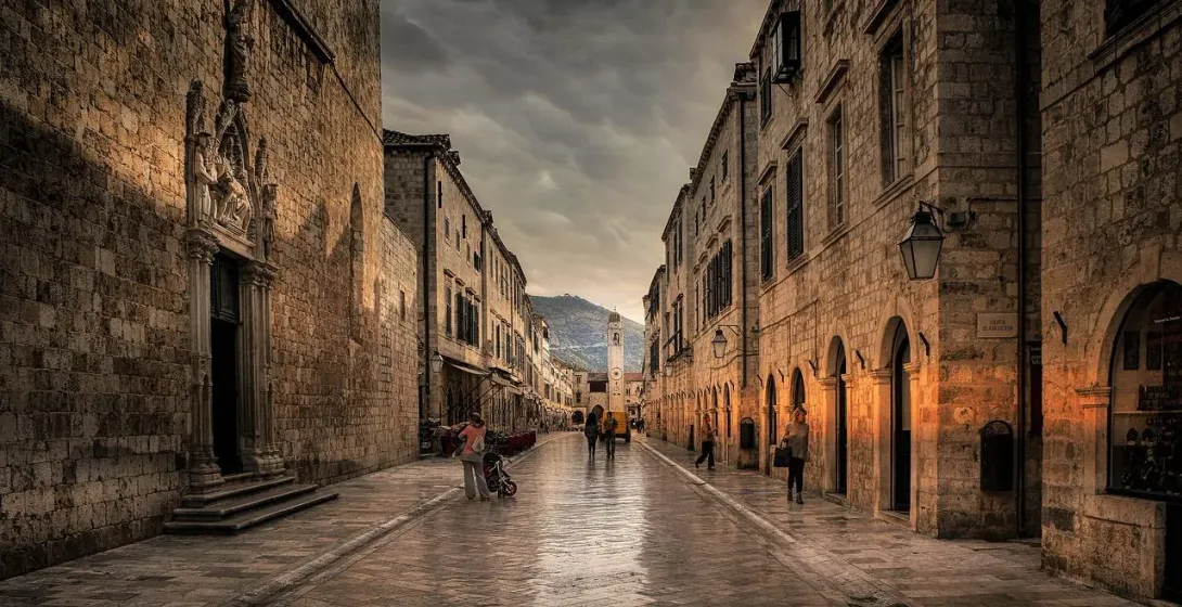 Tourists exploring the charming cobblestone streets of Dubrovnik's Old Town.