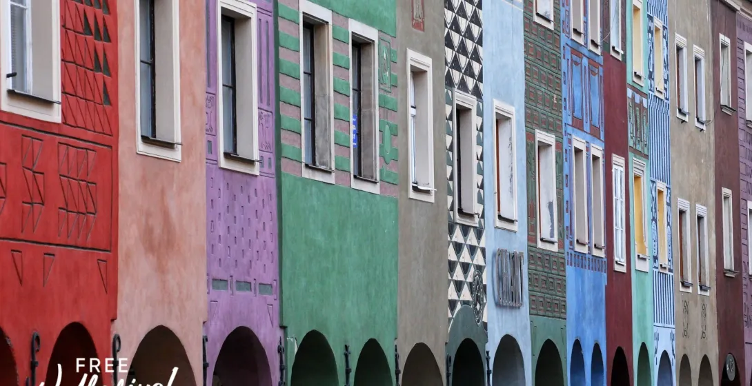 Colorful buildings with unique designs in Gdansk's Old Town, part of a free walking tour.