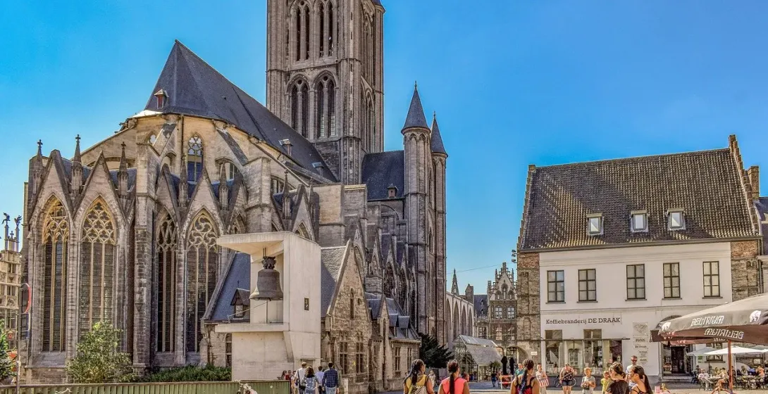 Tourists exploring the historic center of Ghent, Belgium, on a Legends of Ghent Tour.
