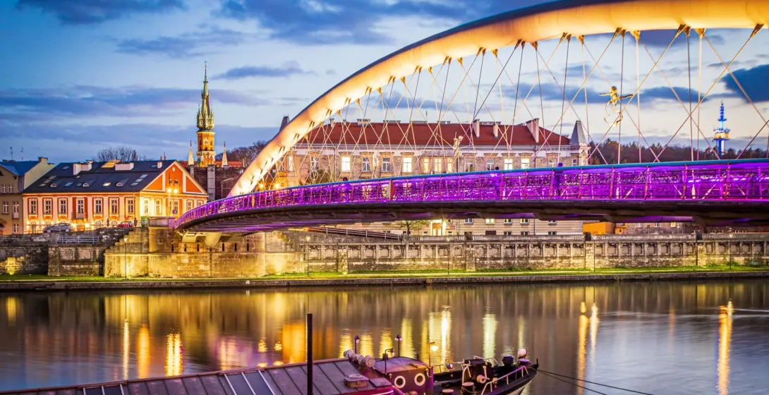 Father Bernatek Footbridge in Krakow at night.