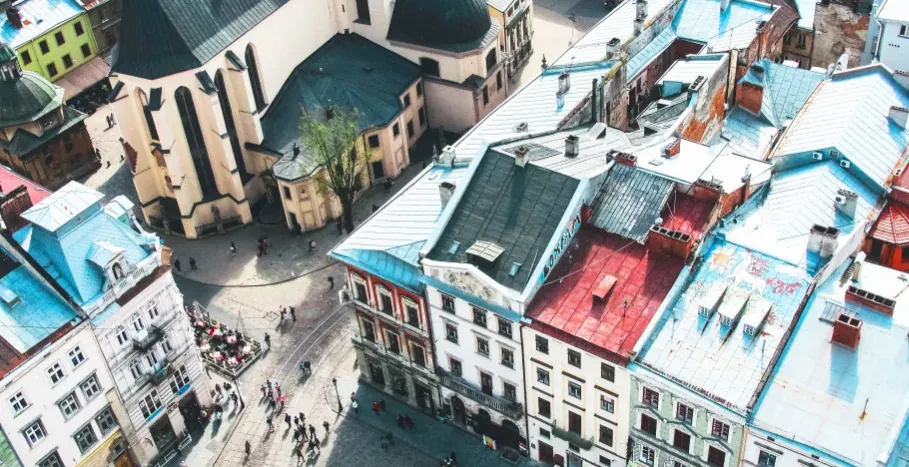 Aerial view of Lviv's Old Town, showcasing colorful buildings and cobblestone streets.