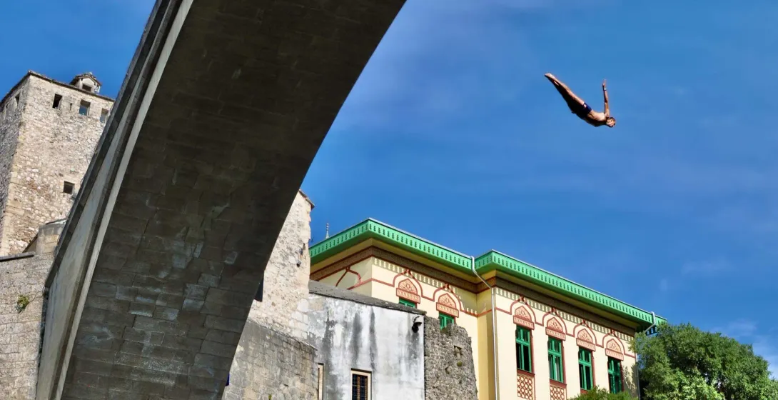Diver leaping from Stari Most in Mostar, Bosnia and Herzegovina.