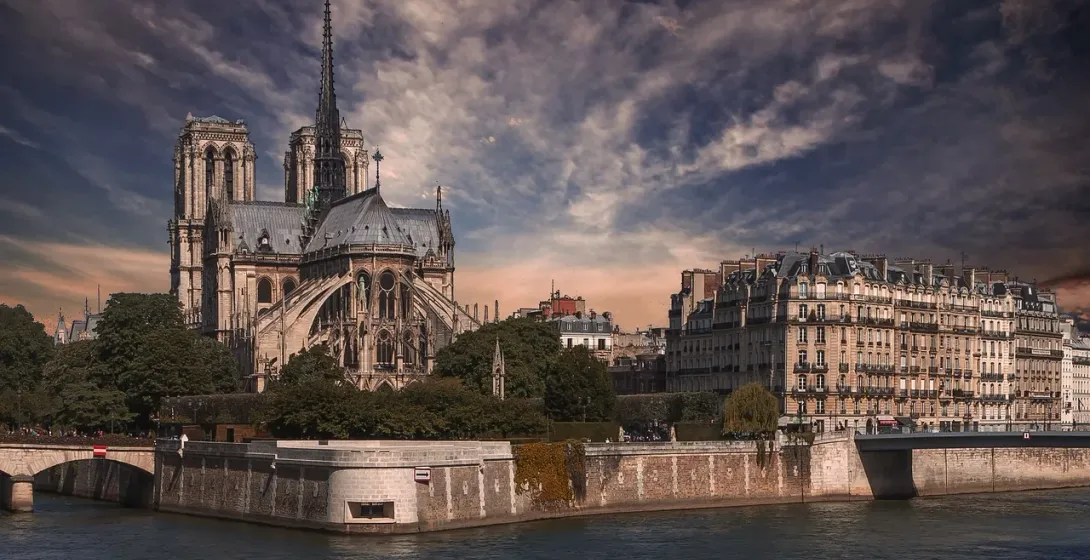 Notre Dame Cathedral in Paris, France, viewed from across the Seine River.