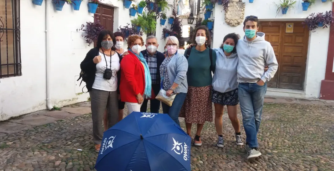 A group of happy tourists on an Oway Tours excursion in Spain.