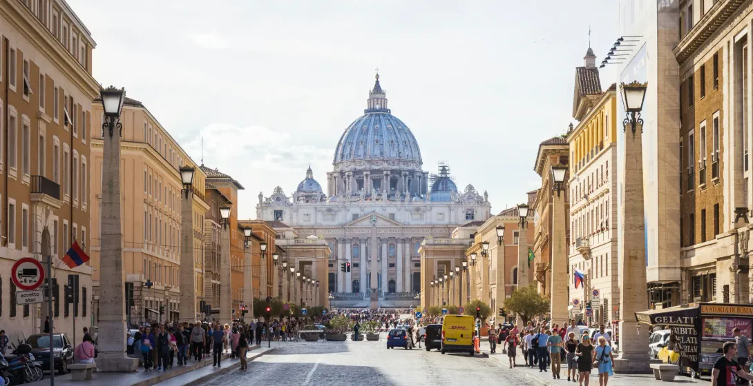 View looking down Via della Conciliazione towards St. Peter's Basilica in the distance, Rome.