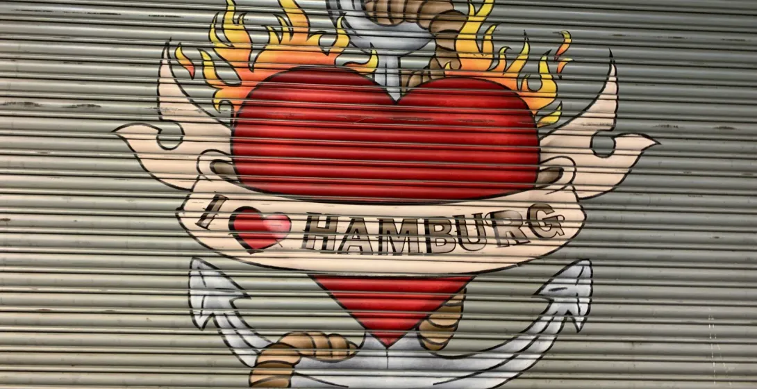 A mural in Hamburg showing a flaming heart and anchor.