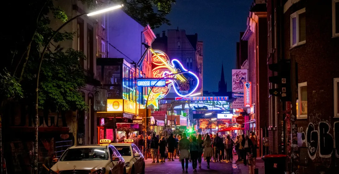Vibrant nightlife on Grosse Freiheit street in Hamburg, Germany.