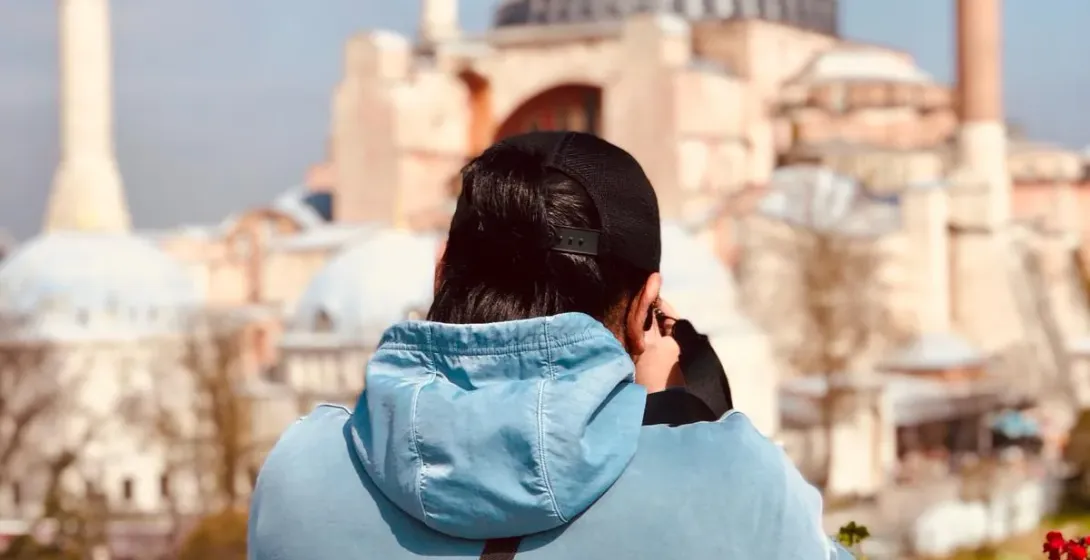 Tourist photographing the Hagia Sophia in Istanbul.