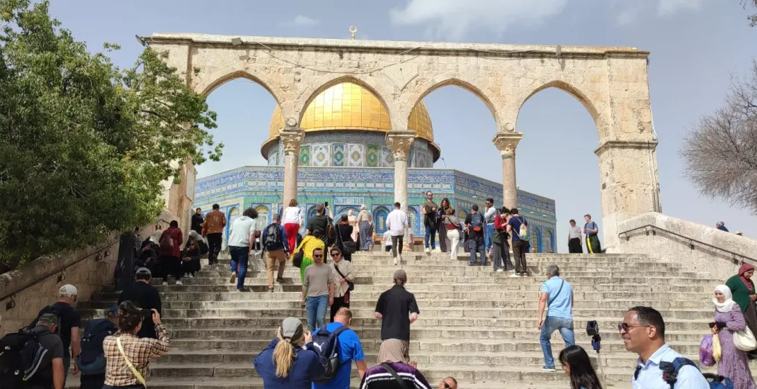 Tourists visiting the Dome of the Rock in Jerusalem.