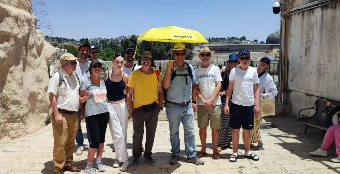 Happy tourists on a guided tour in Jerusalem.