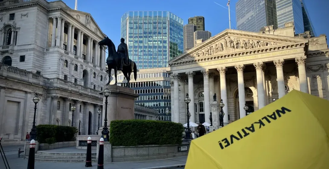 A guided walking tour in London, featuring the Bank of England.