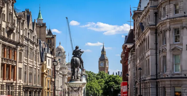 A London street scene with Big Ben in the background.