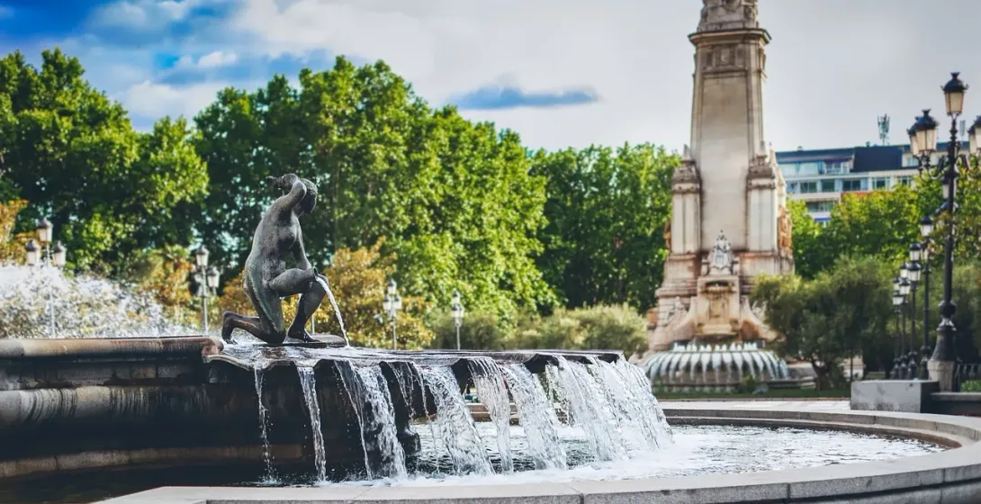 Serene fountain in Madrid with a captivating sculpture.