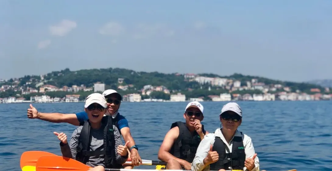 Happy tourists kayaking in Split, Croatia.