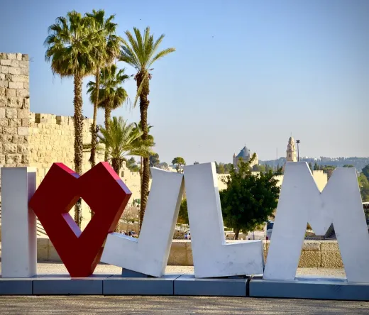 I❤JERUSALEM sign in front of Jerusalem's Old City walls.