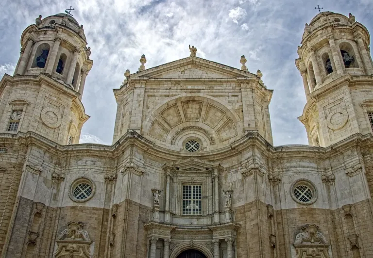 The impressive facade of Cádiz Cathedral in Spain.