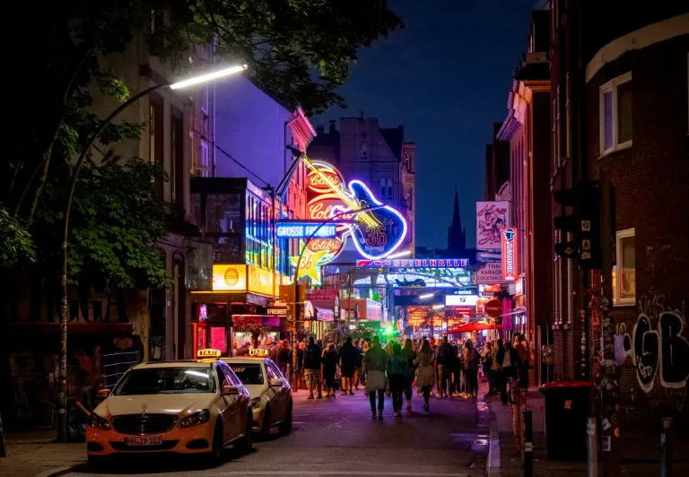Vibrant nightlife on Grosse Freiheit street in Hamburg, Germany.
