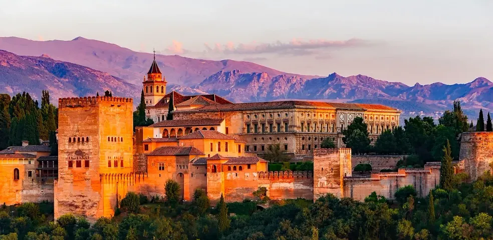 Sunset view of the Alhambra Palace in Granada, Spain.