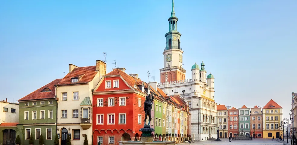 Picturesque Zamość Old Town Market Square in Poland, featuring the Renaissance Town Hall and colorful buildings.
