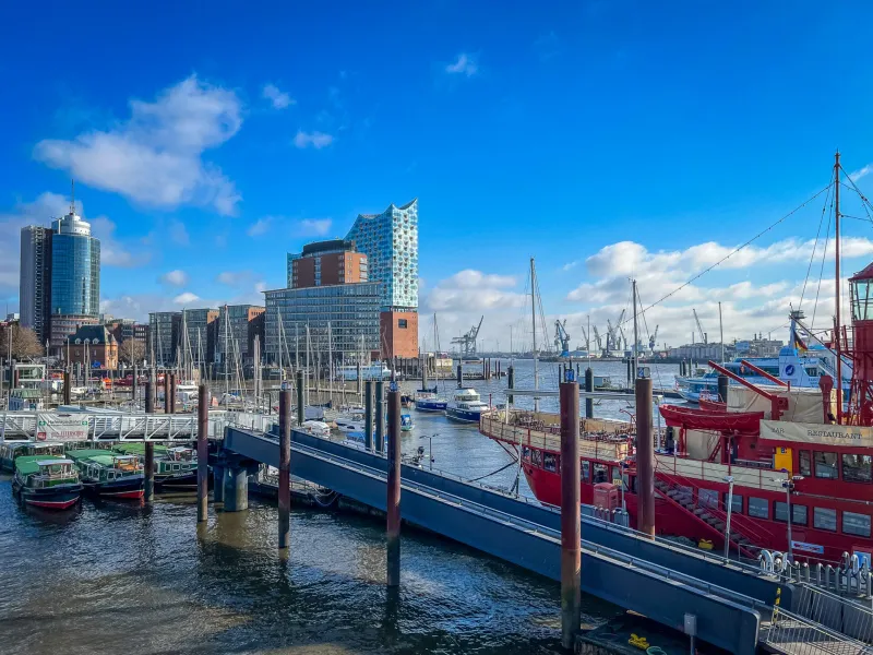 Hamburg's HafenCity harbor with the Elbphilharmonie in the background.