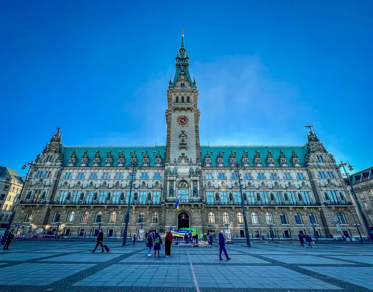 Hamburg City Hall, a stunning architectural landmark, on a sunny day.