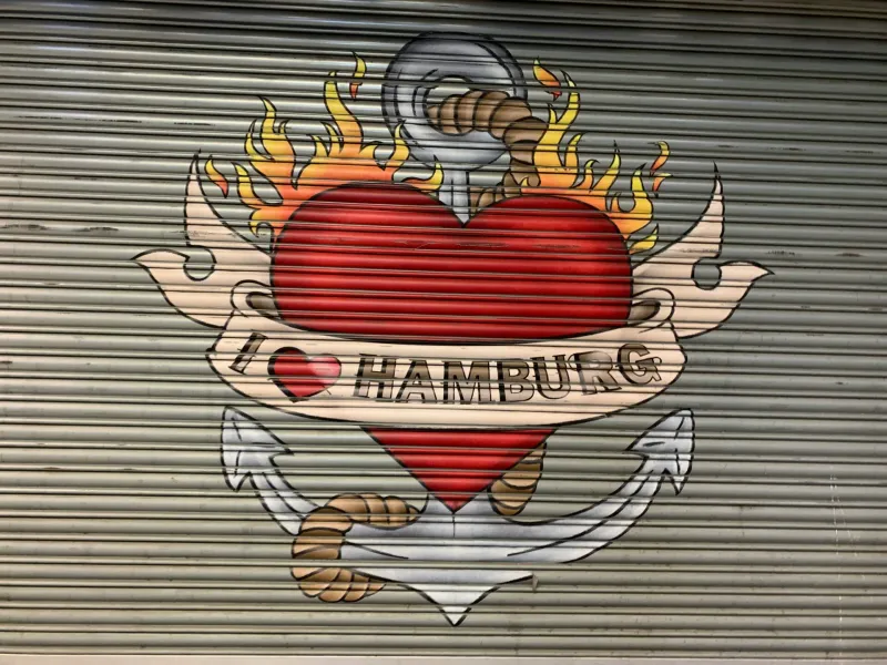 A mural in Hamburg showing a flaming heart and anchor.