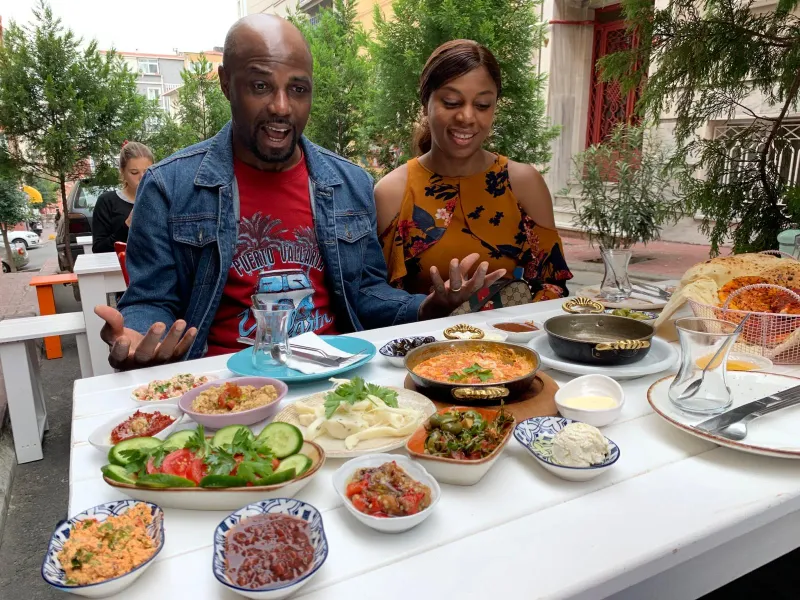 Couple enjoying a delicious Turkish breakfast in Istanbul.
