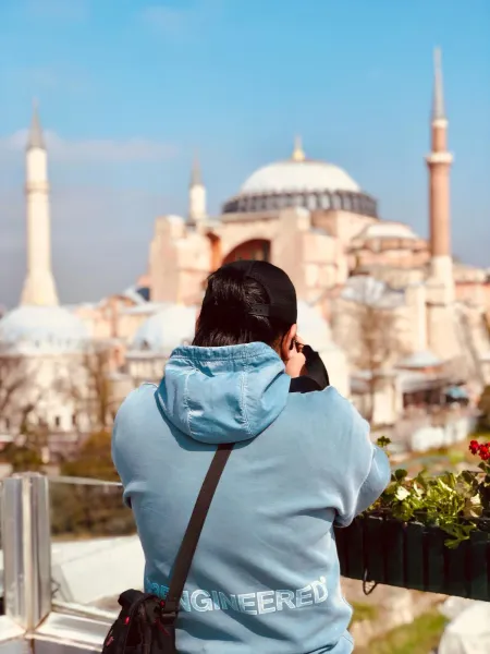 Tourist photographing the Hagia Sophia in Istanbul.