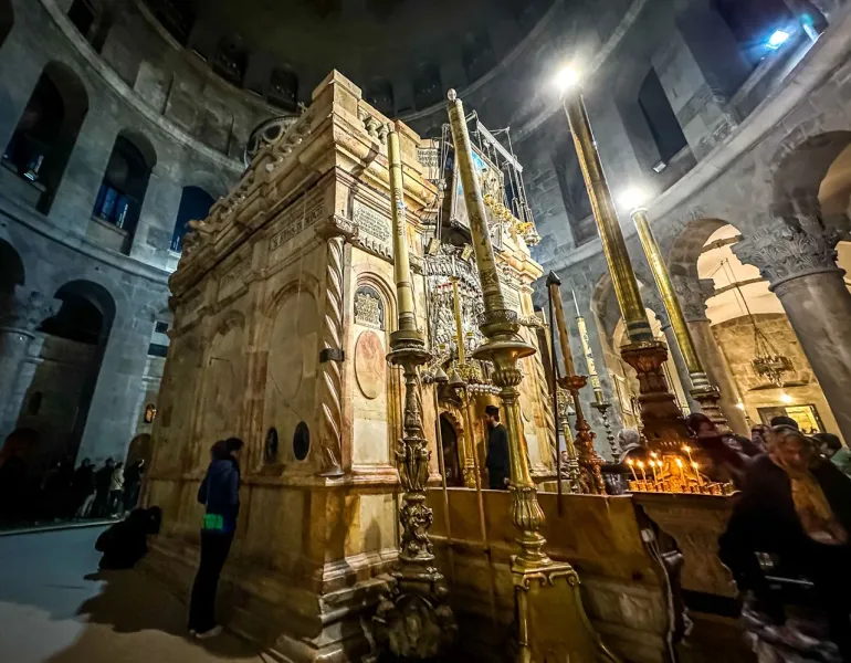 Pilgrims visiting the Edicule, the shrine enclosing Jesus' tomb, in Jerusalem's Church of the Holy Sepulchre.