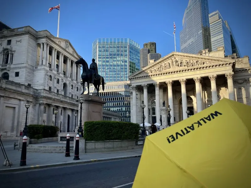 A guided walking tour in London, featuring the Bank of England.