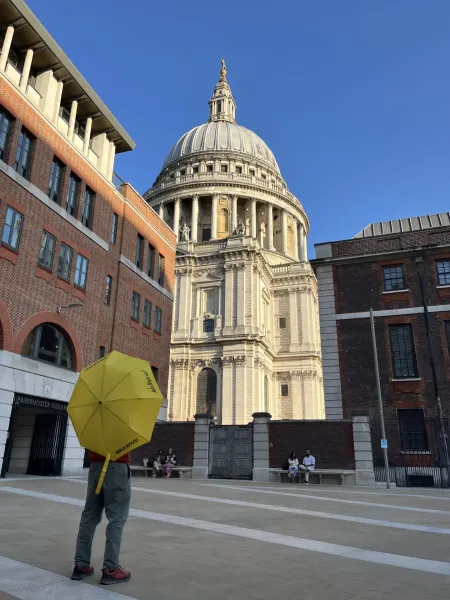 A guided walking tour in London, featuring St. Paul's Cathedral.