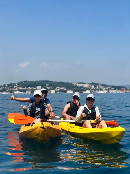Happy tourists kayaking in Split, Croatia.