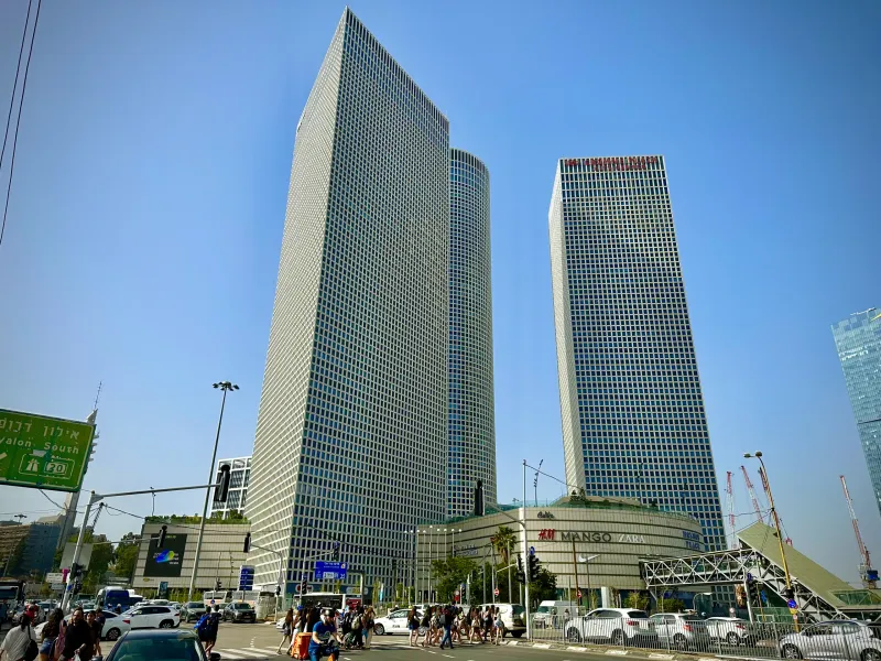 Tel Aviv cityscape featuring the iconic Shalom Meir and Azrieli Sarona Towers.