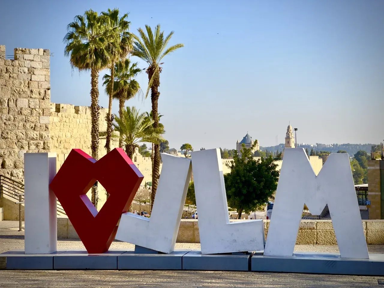 I❤JERUSALEM sign in front of Jerusalem's Old City walls.